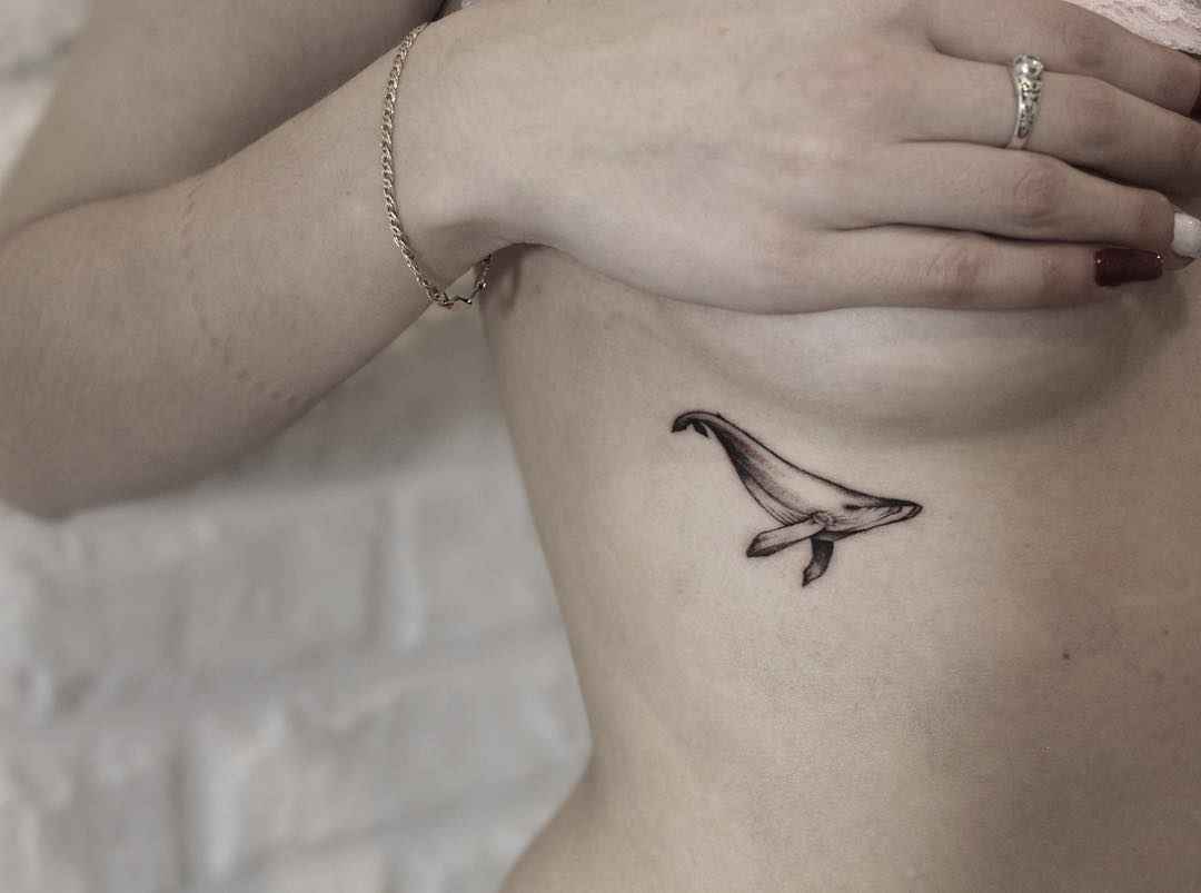 Женские татуировки на груди 2019 животные_11