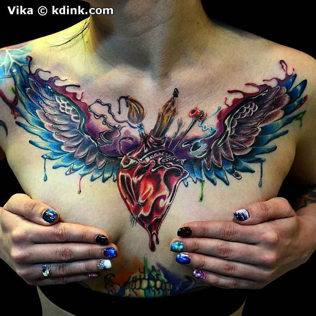 Интересные идеи женской татуировки на груди_13