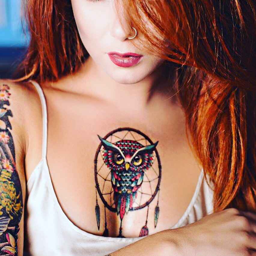 Женские татуировки на груди 2019 животные_3
